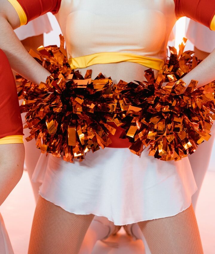 Why are cheerleading uniforms so short?
